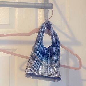 Rhinestone studded grommet bag